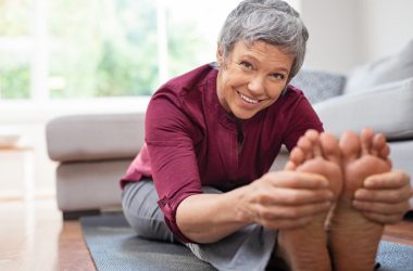 senior woman doing exercise at home