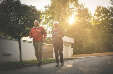 a senior couple running in the morning